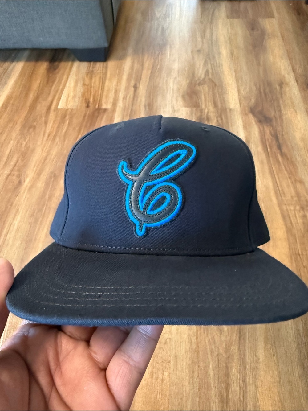 Coach Black Snapback Hat with Teal Embroidered C
